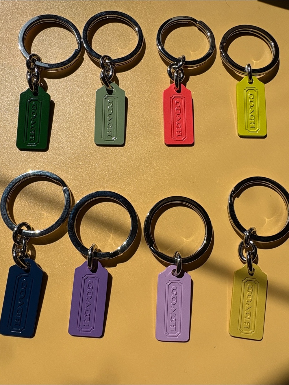Coach bundle of 8 metal Tag Key Ring - Assorted Colors